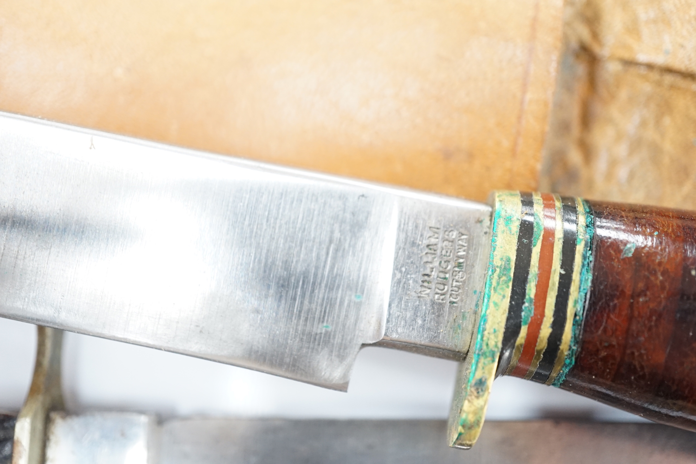 Two antler-handled hunting knives and three other knives